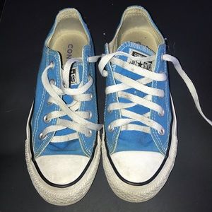 Light blue, low top Converse shoes
